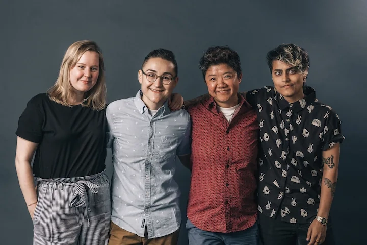 Four happy friends bonding together